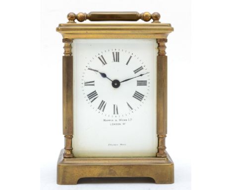 A 20th century Mappin &amp; Webb brass and four glass corniche cased carriage clock, with hexagonal columns, the white dial w
