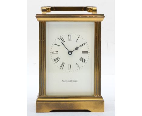 A 20th century Mappin &amp; Webb brass and four glass corniche cased carriage clock, with fluted columns, the white dial with