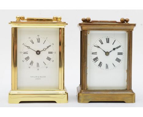 Two 20th century brass corniche cased and four glass glass carriage clocks each with swing handles, comprising of a Taylor &a