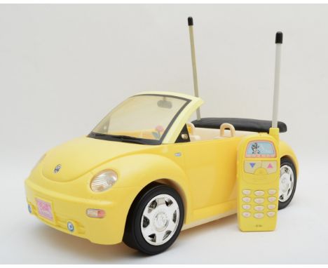 Barbie, a Mattel yellow VW Beetle convertible with telephone remote control. In good condition, showing no damage and little 