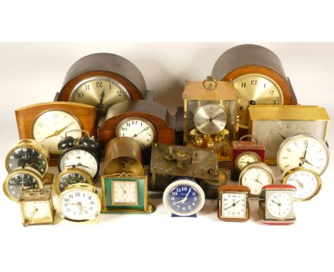 A collection of mid 20th century and later mantel clocks, miniature novelty clocks, traveling/bedside alarm clocks and annive