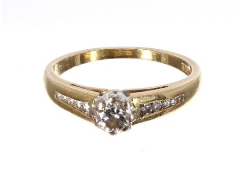 18ct solitaire round brilliant-cut diamond ring with set shoulders, 0.20ct approx, clarity SI1-2, colour J/K, width 5mm, 2.5g