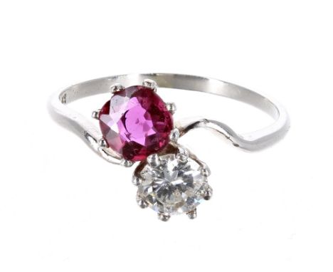 Platinum ruby and diamond cross-over ring, the round ruby 0.47ct approx, round brilliant-cut diamond 0.56ct approx, clarity S