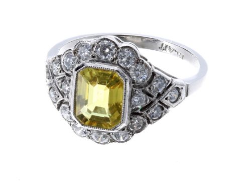 Ornate platinum yellow sapphire and diamond dress ring, the sapphire 1.49ct approx, 13mm, 4.7gm, ring size M/N