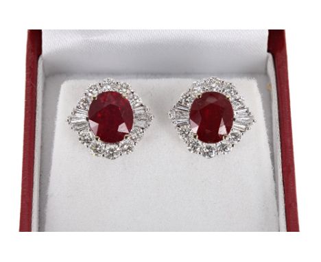 Impressive pair of 18ct white gold ruby and diamond cluster studs, estimated rubies 5.37ct approx, tapered baguette diamonds 