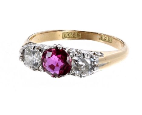 18ct ruby and diamond three stone ring, the central ruby 0.70ct approx, flanked with round diamonds 0.70ct, clarity SI, colou