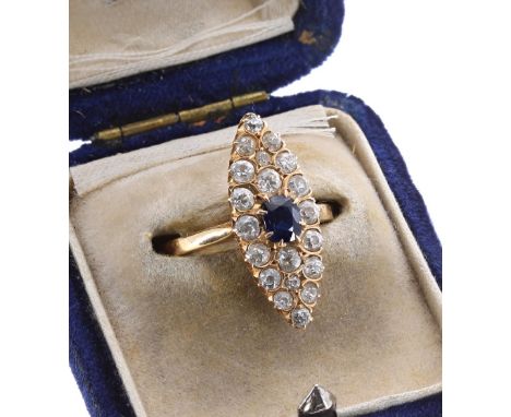 Attractive sapphire and diamond marquise shaped cluster ring, the oval sapphire 0.40ct approx, in a yellow metal setting cons