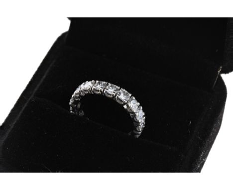 Good quality modern white gold diamond full eternity ring, with eighteen round brilliant-cuts, estimated 1.80ct approx, clari