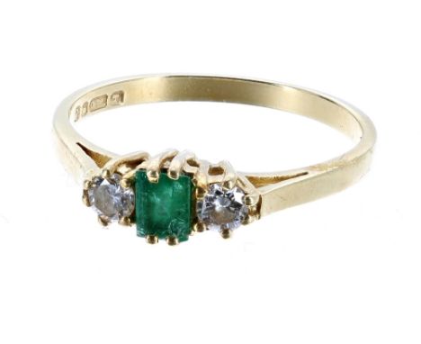 18ct yellow gold emerald and diamond three stone ring, the emerald 0.20ct flanked with round brilliant-cut diamonds, 2.4gm, r