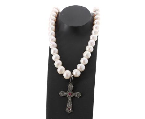 Row of cultured pearls with a diamond and ruby cross pendant, the pearls 11-13mm, 106.3gm, 20" long, the pendant 60mm x 36mm 