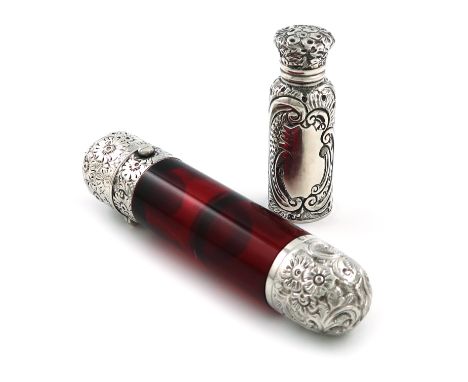 A Victorian silver-mounted red glass double scent bottle, cylindrical glass body, one end with a hinged cover, the other with