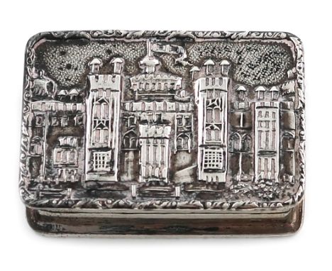 A modern silver 'castle top' snuff/pill box, by S J Rose &amp; Son, Birmingham 1977, rectangular form, the hinged cover with 