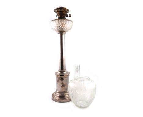 A Victorian electroplated oil lamp, by Elkington and Co. probably 1865, plain tapering column, on a plinth on a raised circul