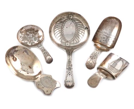 A collection of five antique silver caddy spoons, various dates and makers, including: a George III one of shovel form, by Co