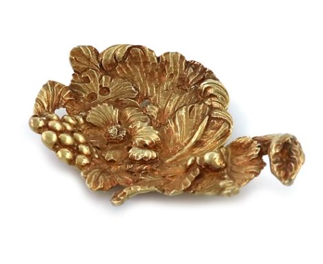 A George III cast silver-gilt caddy spoon, by Edward Farrell, London 1818, leaf form, with berries and a twig handle, length 