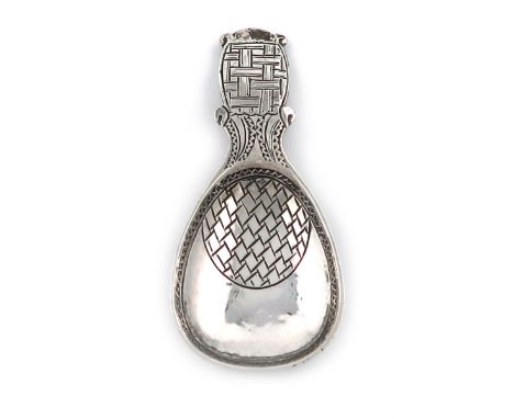 By Liberty and Co., an Arts and Crafts silver caddy spoon, Birmingham 1936, fig-shaped bowl, with intertwined lozenge decorat