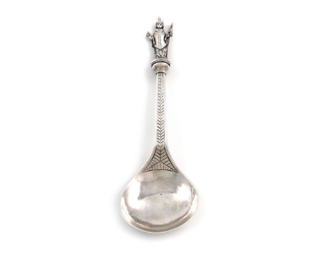 An Edwardian Arts and Crafts silver Apostle spoon, by Edmund Ware, London 1904, fig-shaped bowl, the tapering stem with chase