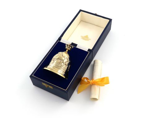 Designed by Anthony Elson for Garrard and Co. Ltd, a commemorative silver-gilt table bell, London 1985, no. 141, circular for