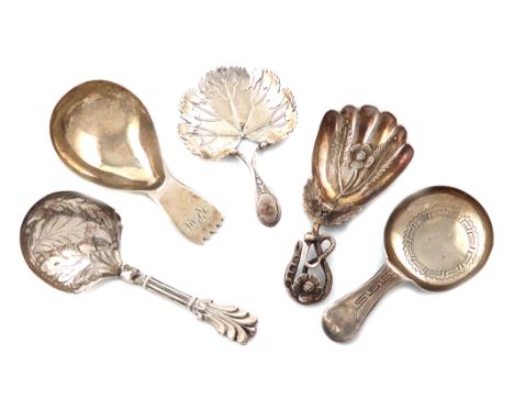 A collection of five antique silver caddy spoons, various dates and makers, including: a George III caddy spoon, by Matthew L