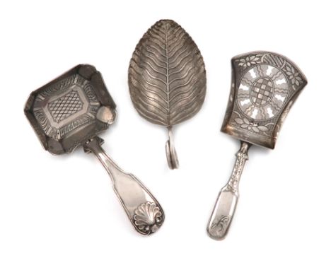 A small mixed lot of thee antique silver caddy spoons, comprising: one of leaf form, by Elizabeth Morley, London 1807, with v