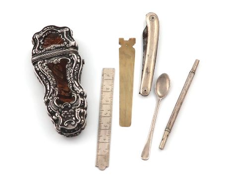 λAn 18th century silver and agate etui, unmarked, shaped tapering oblong form, with panels of agate, the hinged cover opens t