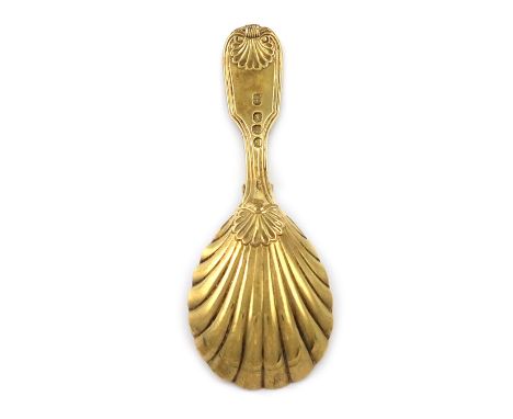 A George IV silver-gilt Fiddle, Thread and Shell pattern caddy spoon, by Paul Storr, London 1820, shell bowl, the terminal en