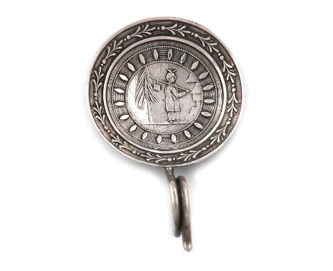 A George III silver caddy spoon, unmarked, the circular bowl embossed with a Chinese figure in a landscape setting, wire-work