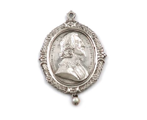 Charles I, a Civil War period silver Royalist Badge, by Thomas Rawlins, oval form, bust of the King to right, wearing decorat