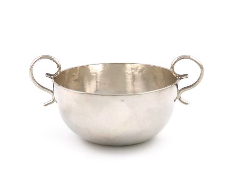 A Queen Anne silver bowl, by Benjamin Bentley, London 1708, circular form, scroll handles, the underside scratch initialled '