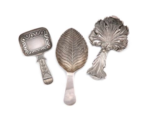 A small collection of three antique silver caddy spoons, comprising: a Victorian one by Wheeler and Cronin, Birmingham 1842, 