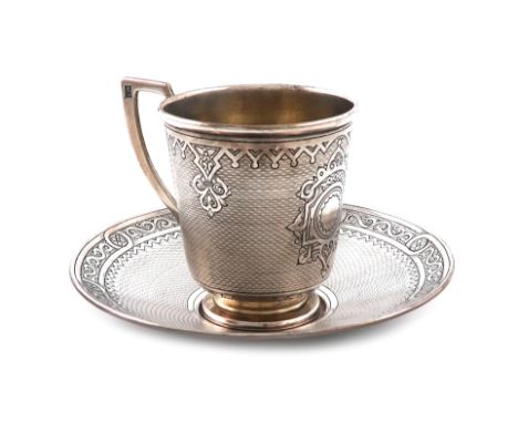 A 19th century Russian silver cup and saucer, assay master Viktor Savinkov, Moscow 1874, tapering circular form, engine-turne