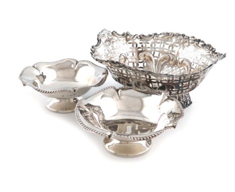 A late-Victorian silver basket, by Charles Boyton, London 1895, oval form, pierced and embossed with foliate and trellis deco