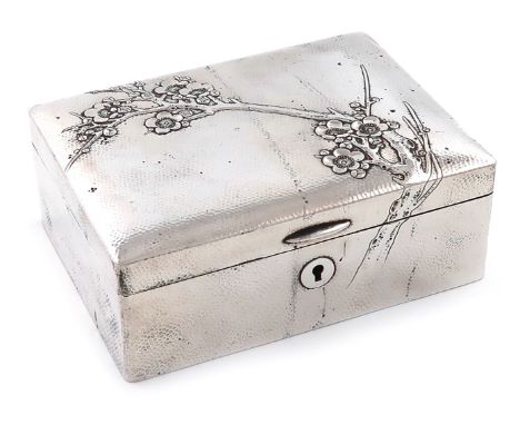 A Japanese silver jewellery box, circa 1920, maker's mark of an arrow and target, rectangular form, the hinged cover with che