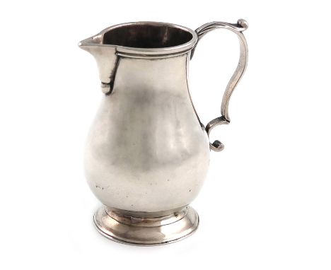 A George III provincial silver 'sparrow-beak' cream jug, by Joseph Walley of Liverpool, Chester 1786, baluster form, plain sp