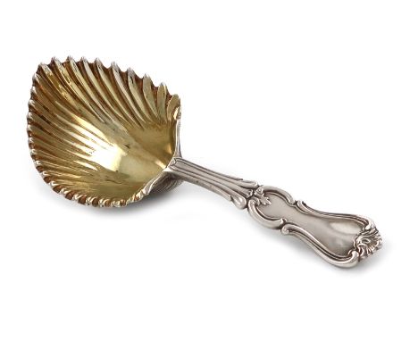 A Victorian silver Albert pattern caddy spoon, by George Adams, London 1843, cast shell bowl, gilded interior, length 10.8cm,