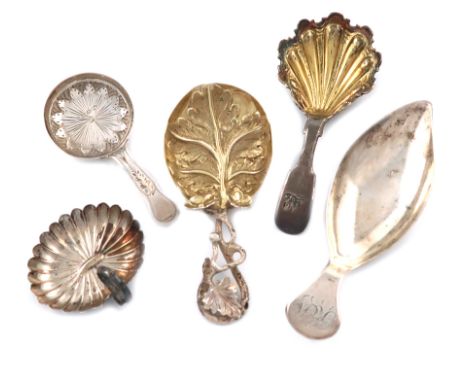 A collection of five antique silver caddy spoons, various dates and makers, including: a George III one, by Samuel Pemberton,