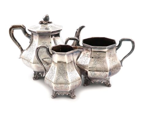 λA three-piece Victorian silver tea set, by George Angell, London 1850/51, panelled baluster form, engraved decoration, scrol