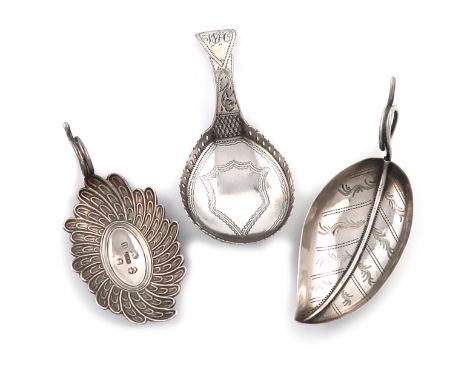 A small collection of three antique silver caddy spoons, comprising: one of leaf form, by Joseph Taylor, Birmingham 1800, eng