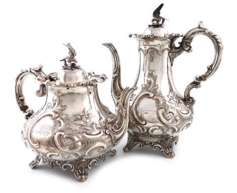 λA Victorian silver coffee pot and tea pot, by William Smily, London 1858, baluster form, embossed foliate scroll decoration,