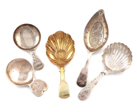 A collection of five antique silver caddy spoons, various dates and makers, including: a George III Fiddle pattern caddy spoo