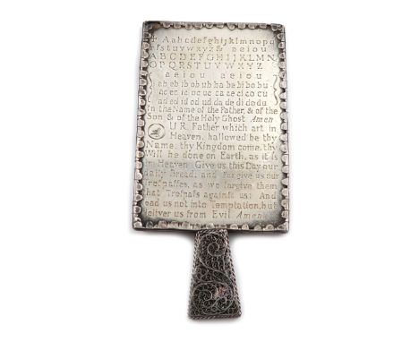 A late 17th century silver filigree-mounted 'horn' book, unmarked, circa 1690, rectangular form, with foliate scroll filigree