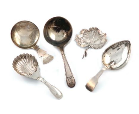 A collection of five antique silver caddy spoons, various dates and makers, including: a George III one of strawberry leaf fo