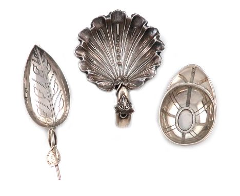 A small collection of three antique silver caddy spoons, comprising: a Victorian one by George Unite, Birmingham 1860, fluted