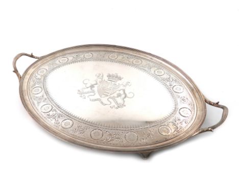 A George III silver two-handled tray, over-struck with maker's mark of by Crouch and Hannam, London 1793, oval form, reeded b