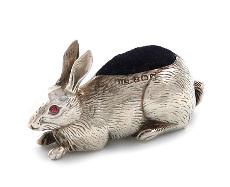 An Edwardian novelty silver rabbit pin cushion, by Adie and Lovekin, Birmingham 1907, with textured fur decoration and set wi