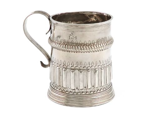 A William III West Country silver mug, by John Murch, Plymouth circa 1695, tapering circular form, part-fluted decoration, ro