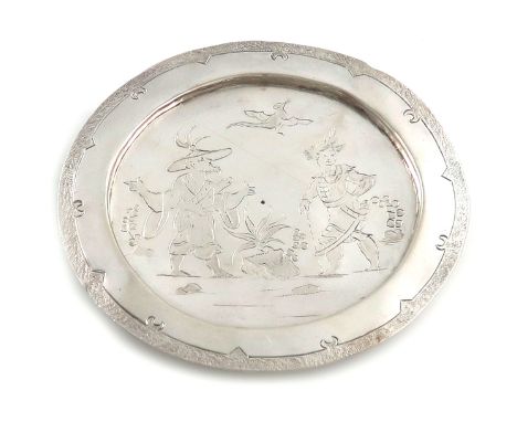 A late 17th century silver West Country paten or small footed dish in the Chinoiserie manner, by William Crossley, Gloucester