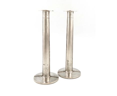 By Adrian K A Hope, a pair of modern silver candlesticks, Edinburgh 1995, tapering columns, matted decoration, with two verti