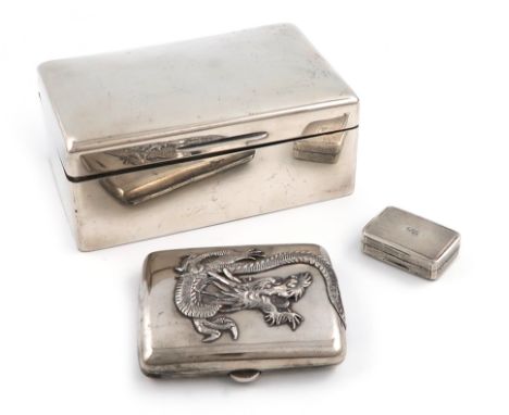 A small mixed lot of silver items, comprising: a cigarette box, by Mappin and Webb, London 1943, rectangular form, wood lined