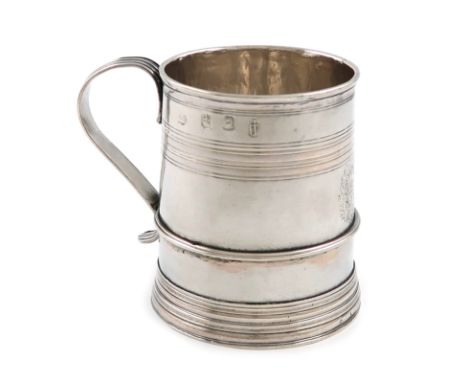 A William III silver mug, by William Andrews, London 1701, slight tapering circular form, reeded scroll handle and decoration